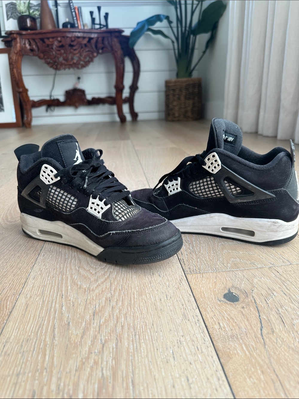 Nike Air Jordan 4 Men’s Black and White Sneakers